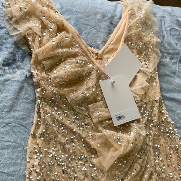 Mac Duggal Sequin Ruffle Asymmetric
Neck Tulle Gown/with Flutter Cap Sleeves - Picture 10 of 14